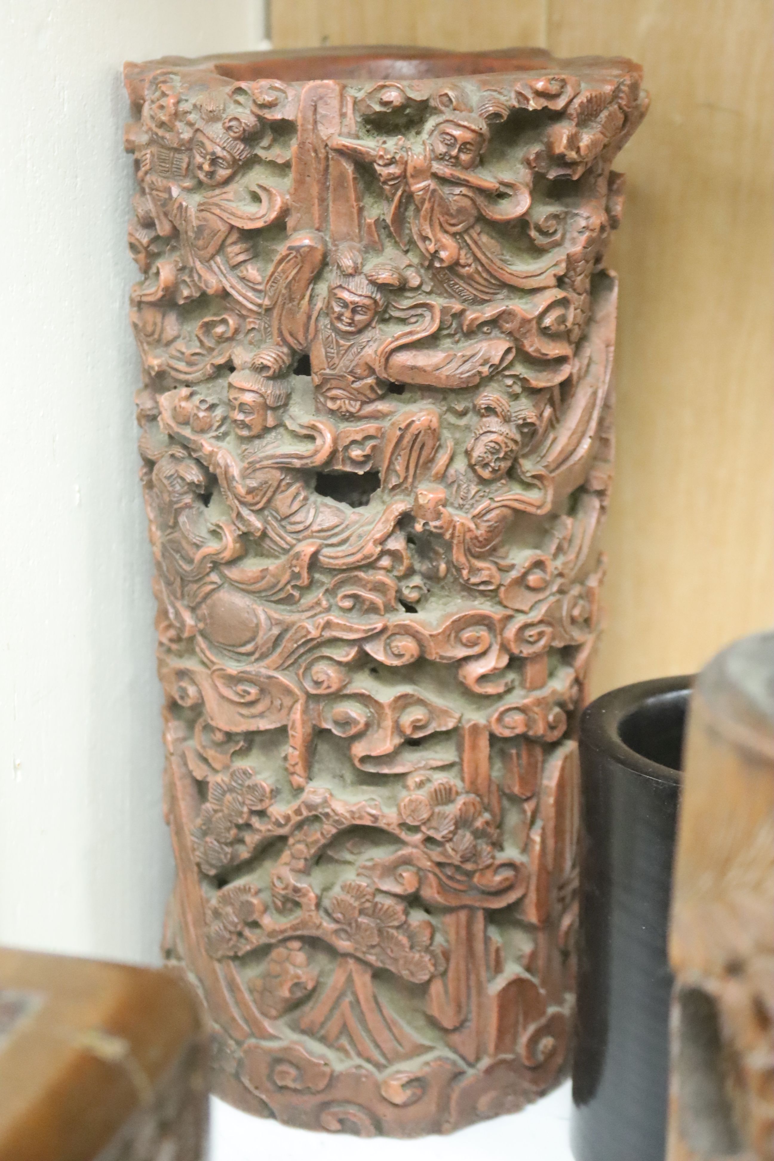 A quantity of 20th century Chinese carved bamboo and wooden effects to include a large brush pot, 17cm high (7)